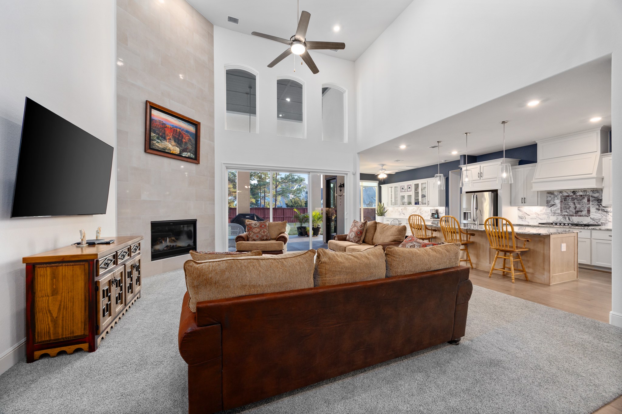 8538 Tynan Ridge Drive Magnolia, TX 77354 - Photo 27 of 50 a living room with fireplace furniture and a flat screen tv