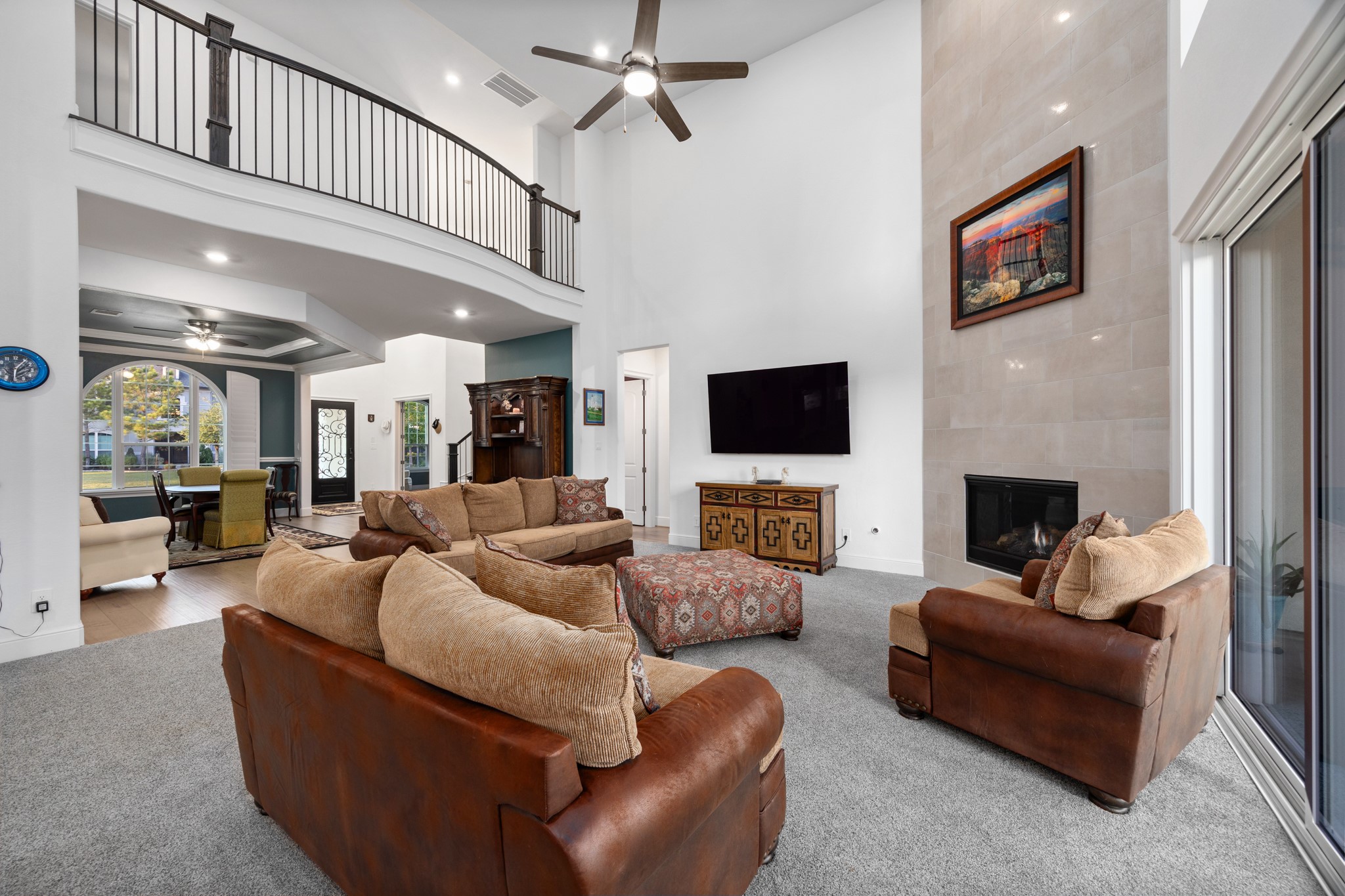 8538 Tynan Ridge Drive Magnolia, TX 77354 - Photo 29 of 50 a living room with furniture and a flat screen tv