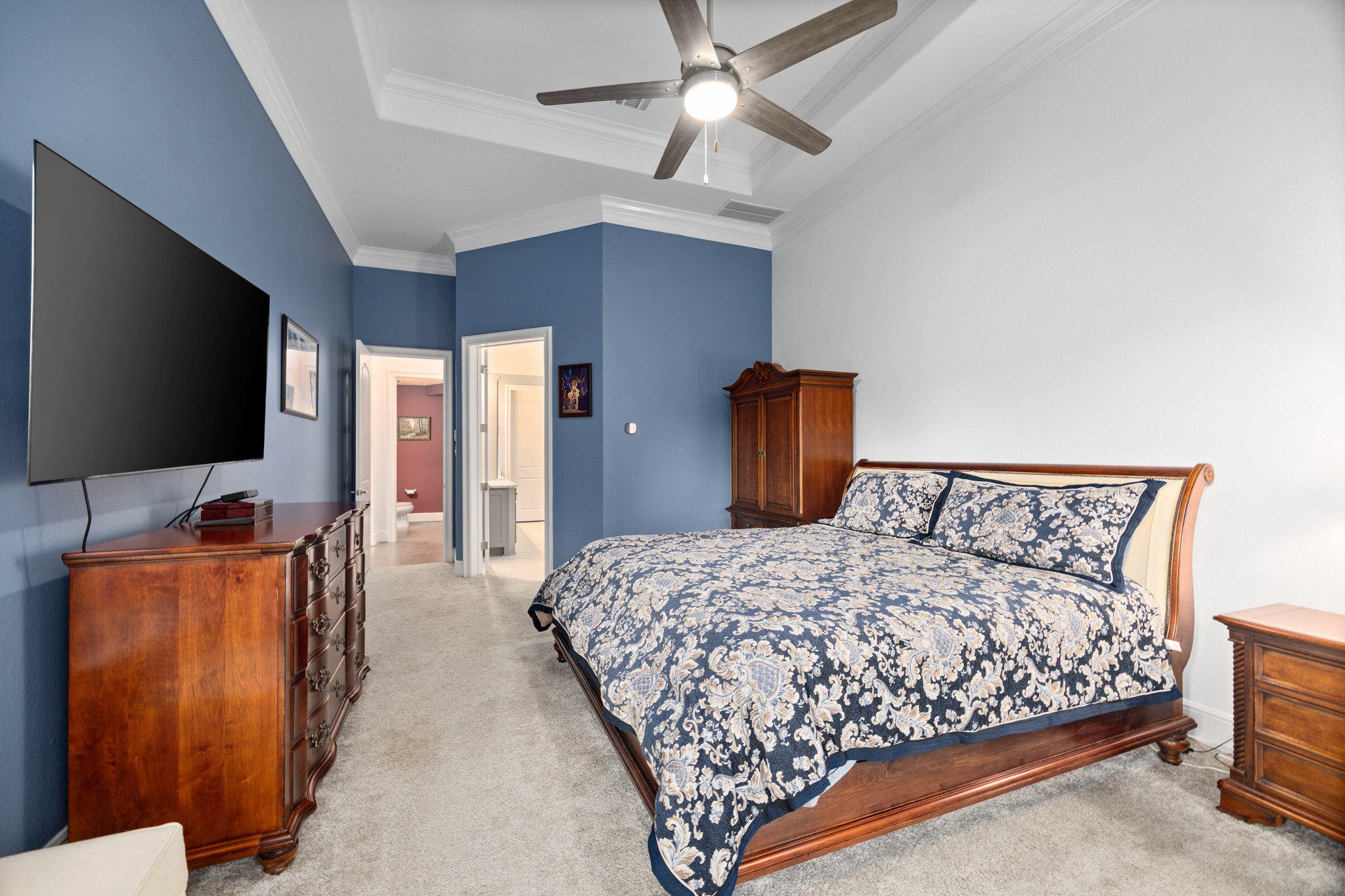 8538 Tynan Ridge Drive Magnolia, TX 77354 - Photo 36 of 50 a bedroom with bed and flat screen tv