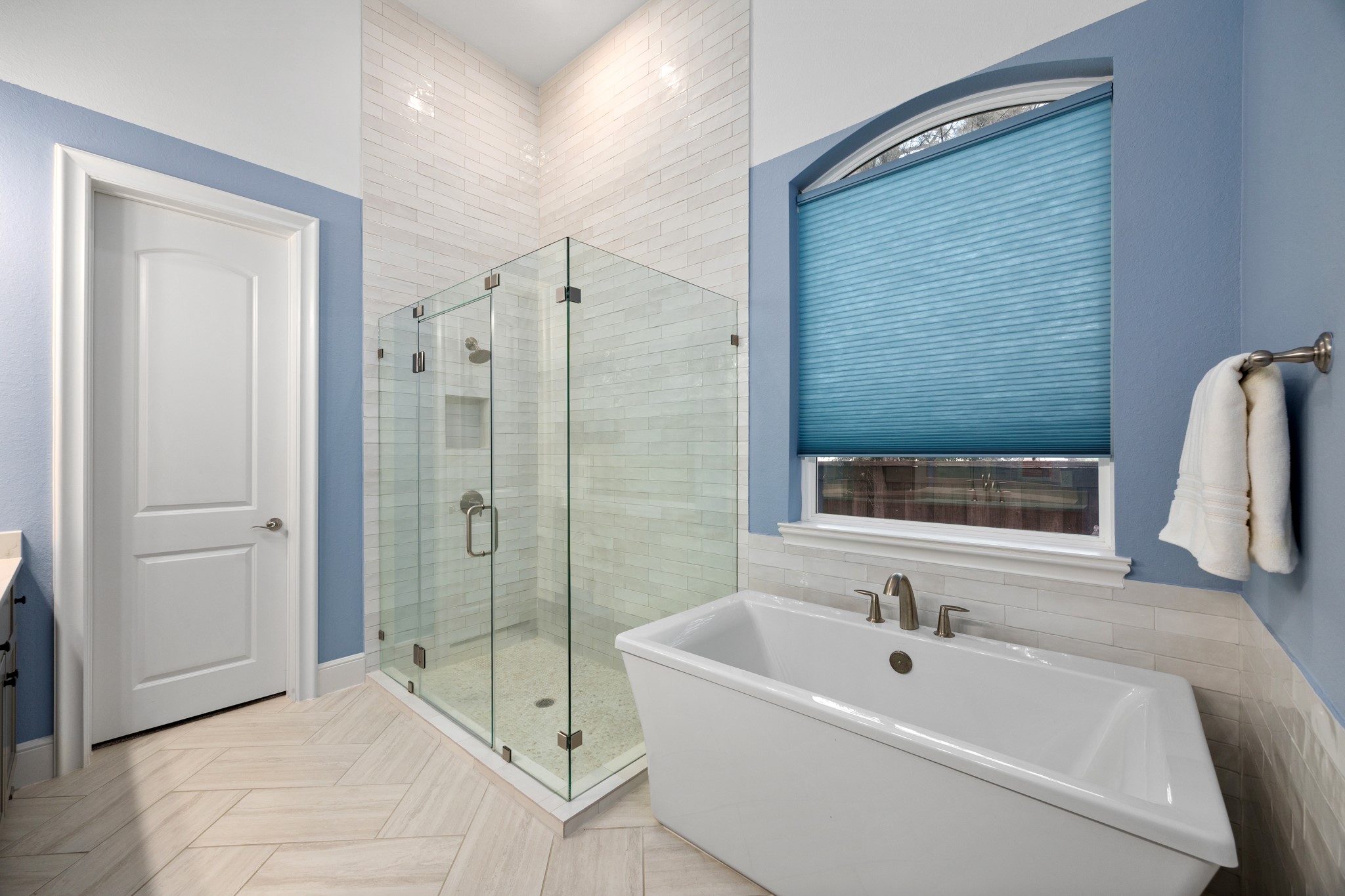 8538 Tynan Ridge Drive Magnolia, TX 77354 - Photo 39 of 50 a bathroom with a tub a sink and shower