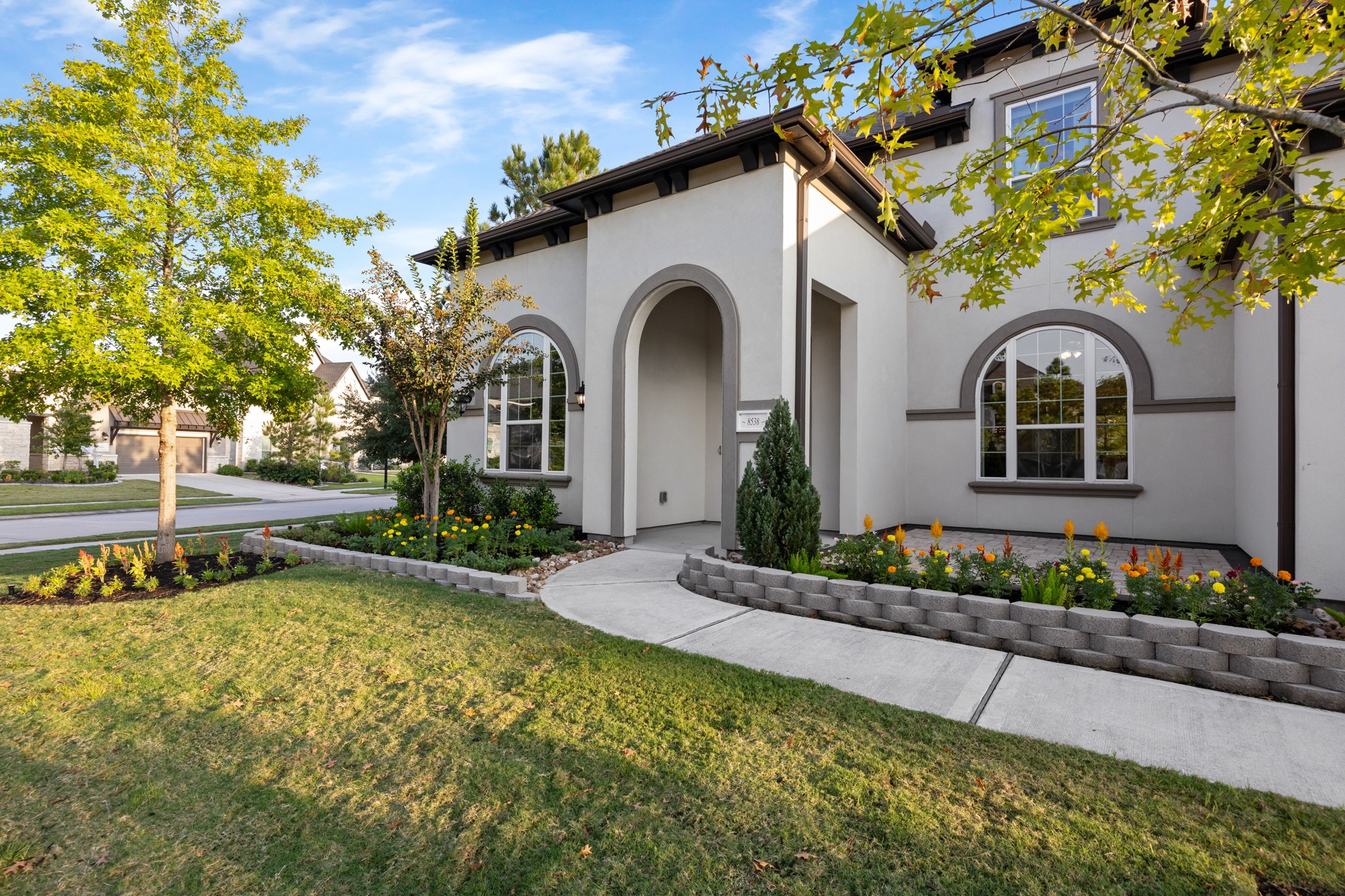 8538 Tynan Ridge Drive Magnolia, TX 77354 - Photo 4 of 50 a front view of a house with a garden