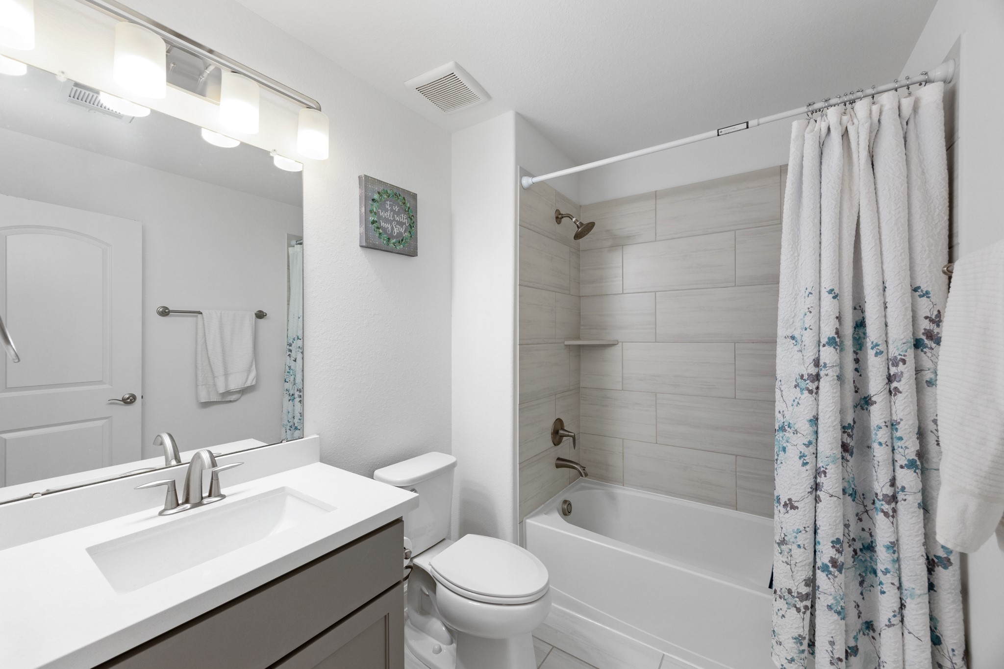 8538 Tynan Ridge Drive Magnolia, TX 77354 - Photo 44 of 50 a bathroom with a sink a toilet and shower