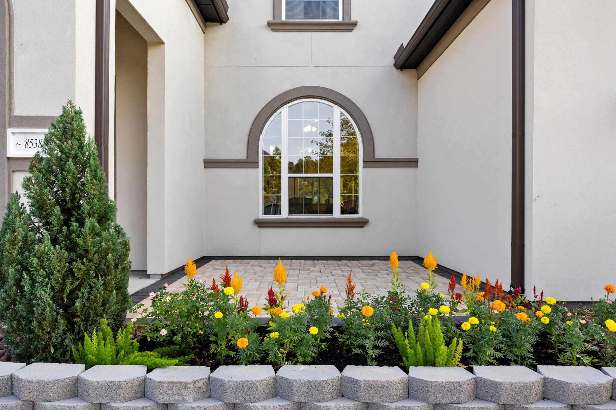 8538 Tynan Ridge Drive Magnolia, TX 77354 - Photo 6 of 50 a front view of a house with a garden