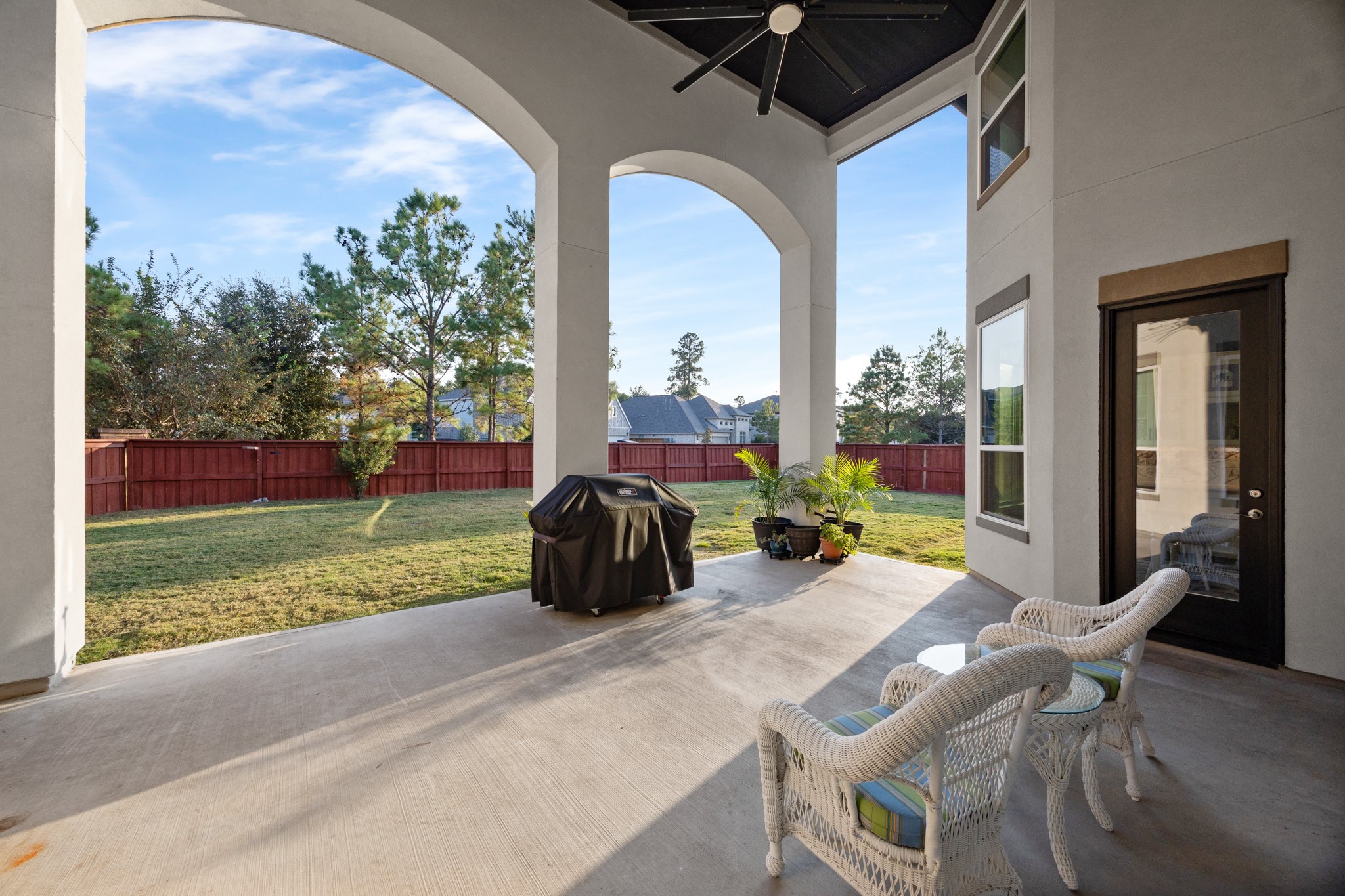 8538 Tynan Ridge Drive Magnolia, TX 77354 - Photo 8 of 50 a view of a porch with furniture and garden