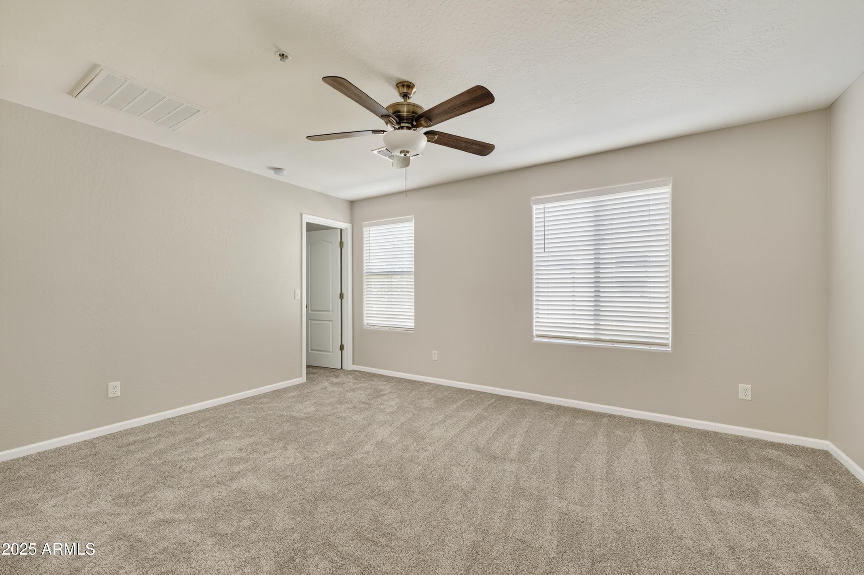 1250 South Rialto, Unit 31 Mesa, AZ 85209 - Photo 11 of 30 a view of an empty room with a window