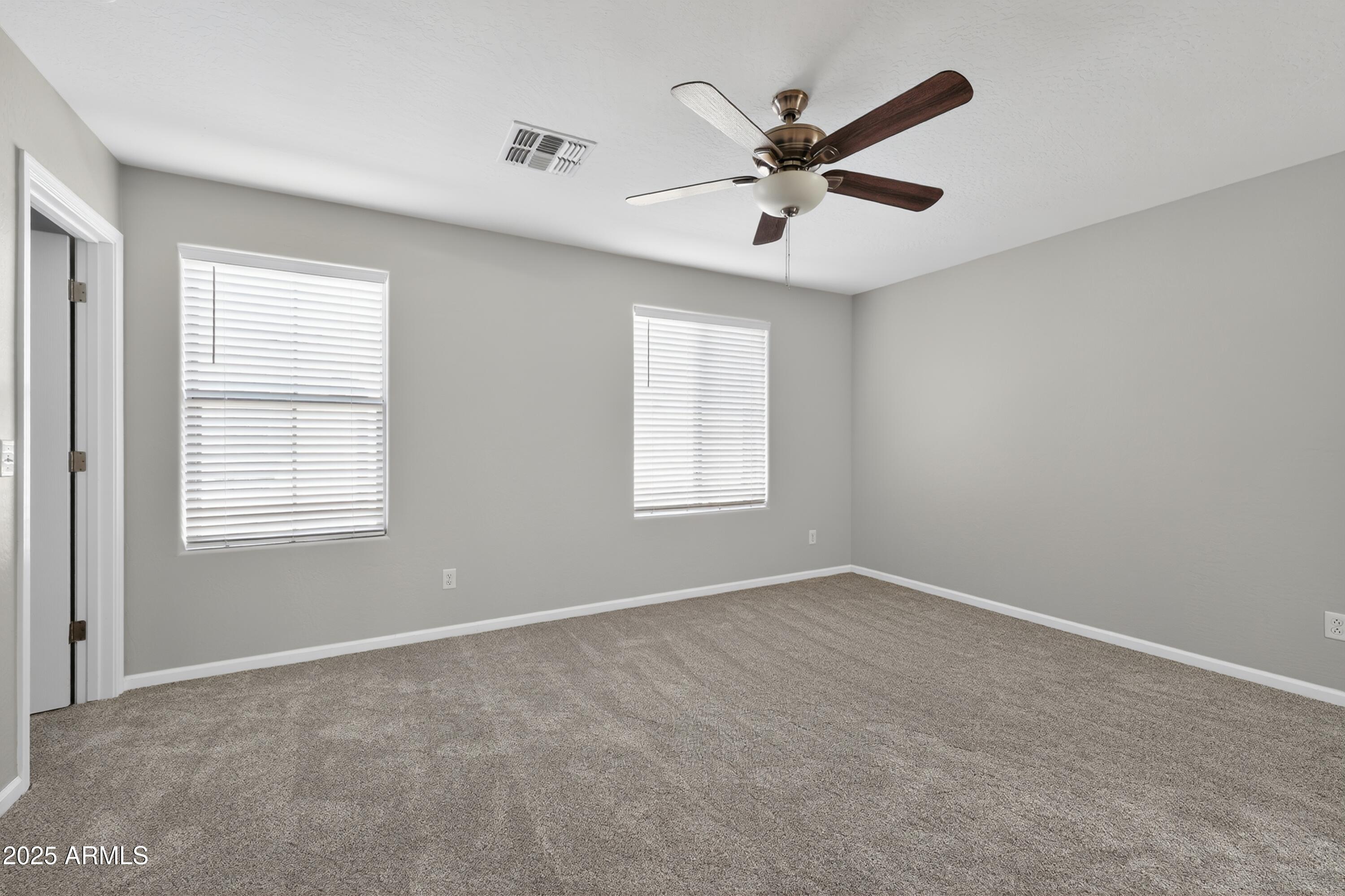 1250 South Rialto, Unit 31 Mesa, AZ 85209 - Photo 12 of 30 a view of an empty room with a window