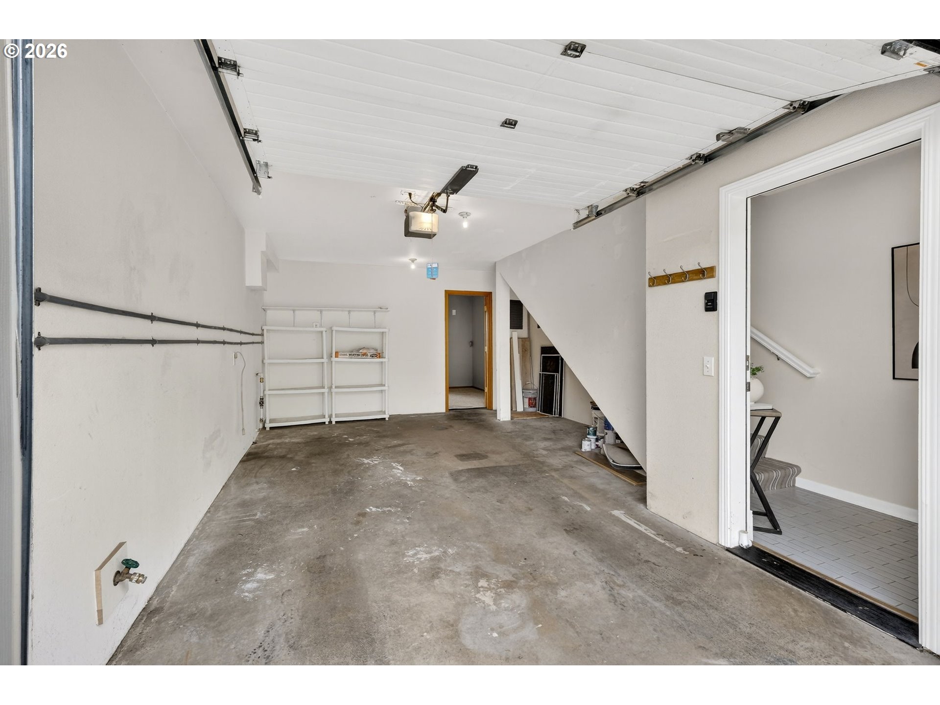 4934 Southwest 1st Avenue Portland, OR 97239 - Photo 28 of 33 a view of a garage with white walls