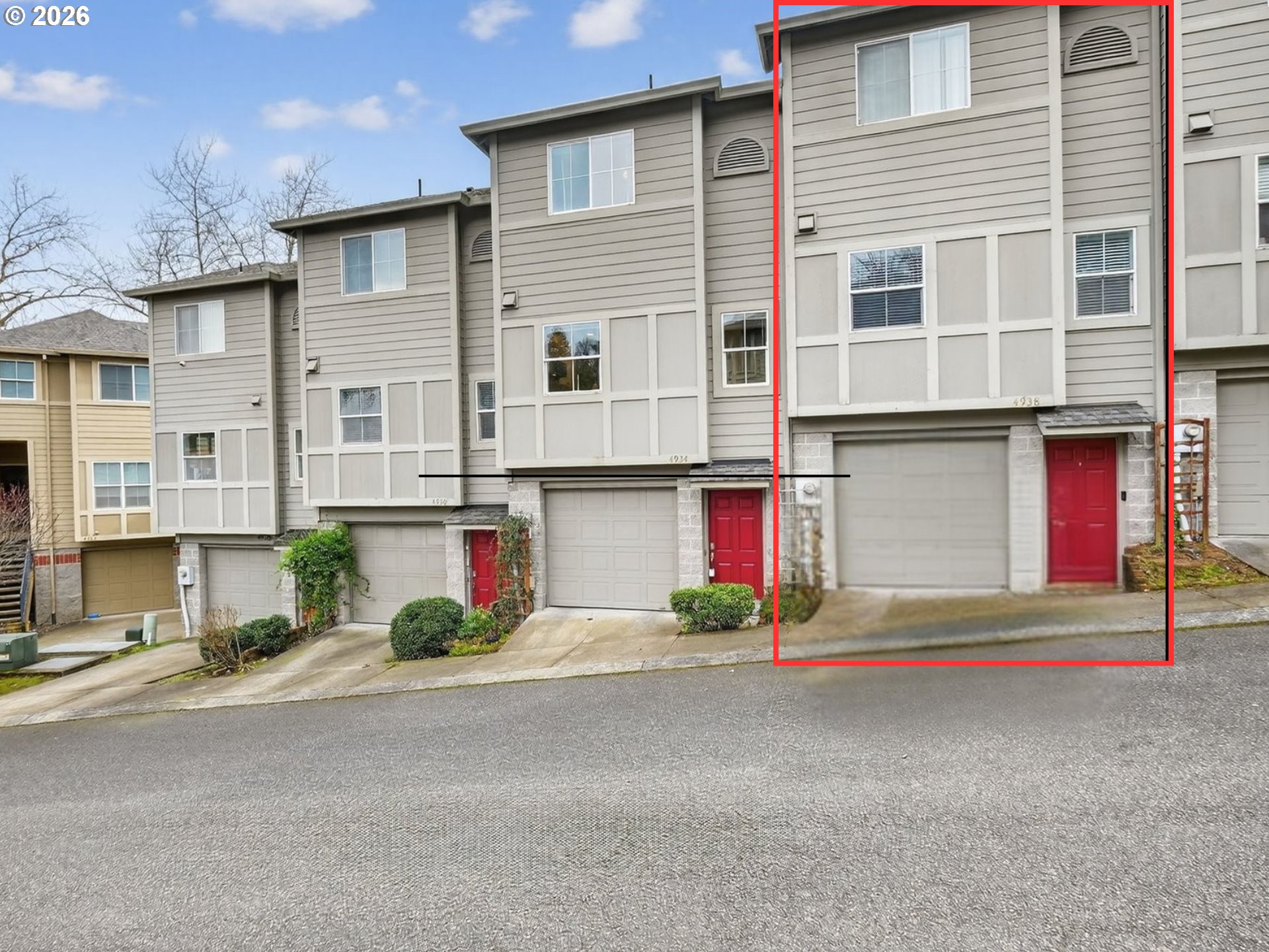4934 Southwest 1st Avenue Portland, OR 97239 - Photo 33 of 33 a front view of a house with garage