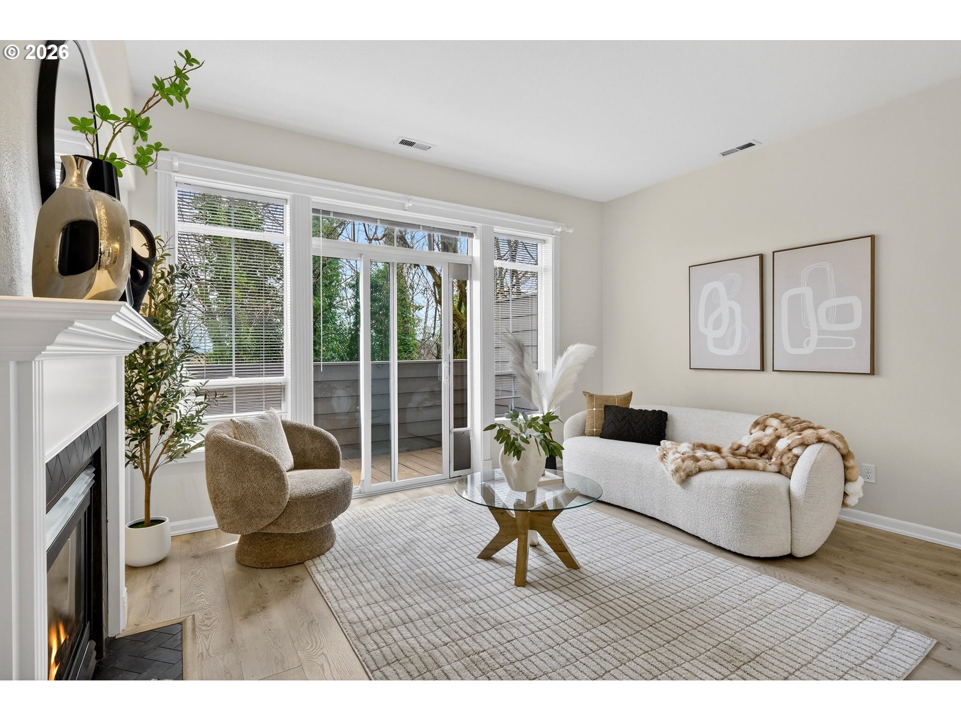 4934 Southwest 1st Avenue Portland, OR 97239 - Photo 4 of 33 a living room with furniture and a fireplace