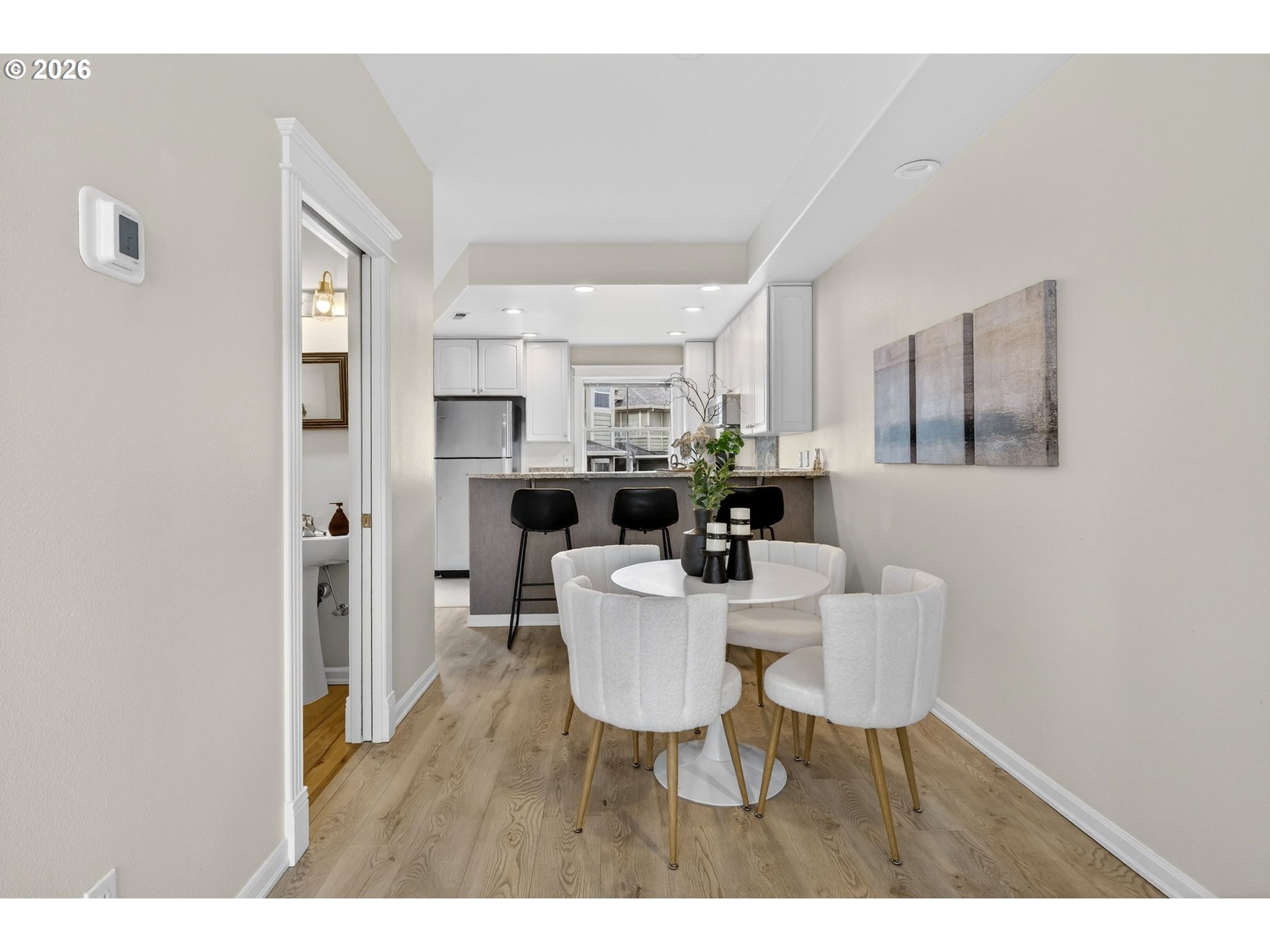 4934 Southwest 1st Avenue Portland, OR 97239 - Photo 8 of 33 a dining room with furniture and wooden floor