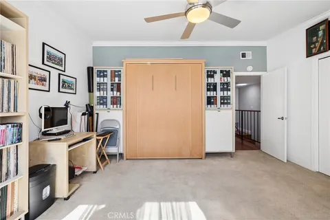 a view of a livingroom with a flat screen tv