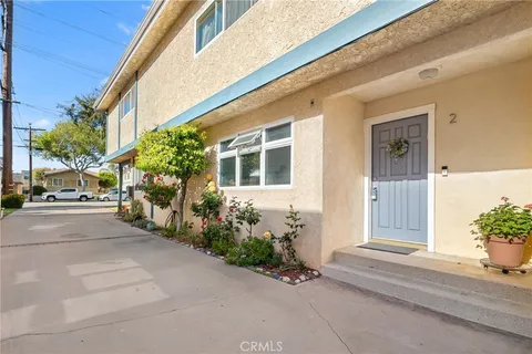 a front view of a house with a garage