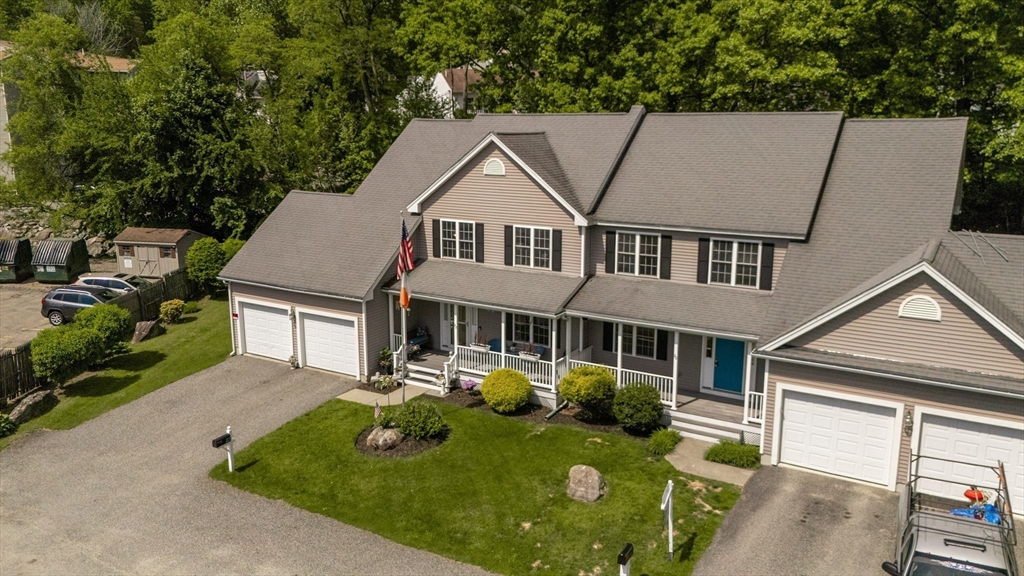 22 Duluth Street Worcester, MA 01604 - Photo 1 of 35 a aerial view of a house with yard porch and furniture
