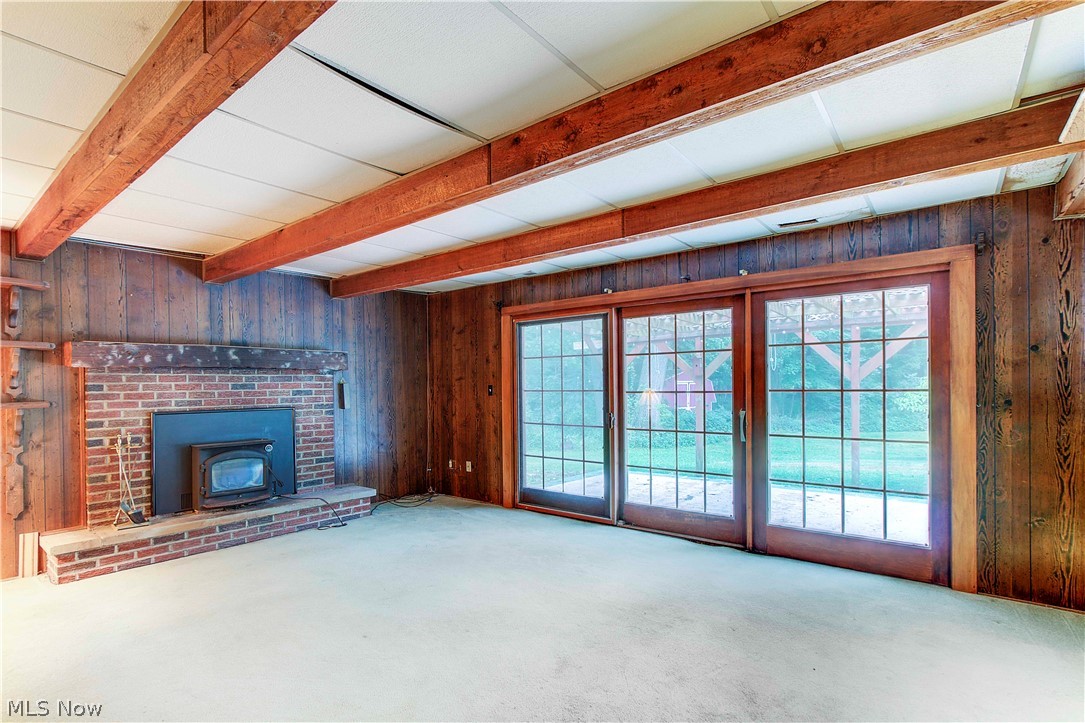 5839 Myers Road New Franklin, OH 44319 - Photo 15 of 34 Family room is great for game night or a cozy evening around the fire.