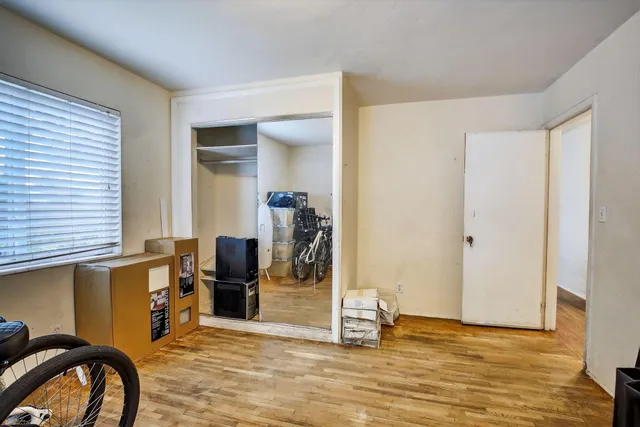 a view of a livingroom with wooden floor