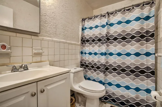 a bathroom with a sink and a toilet