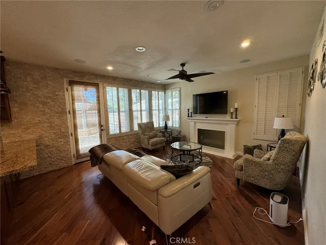 a kitchen with stainless steel appliances granite countertop a stove a refrigerator and a refrigerator