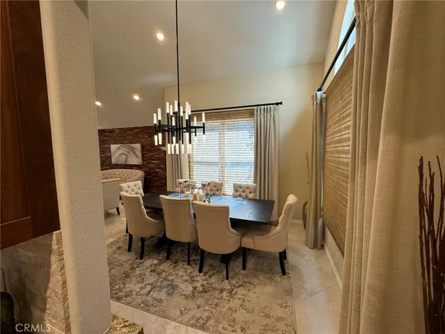 a room with furniture and a large window