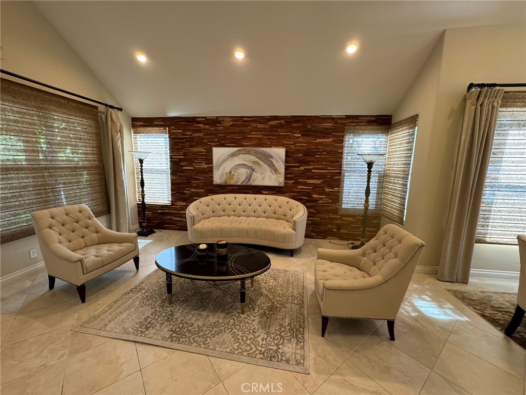 6 Lakeridge Rancho Santa Margarita, CA 92679 - Photo 32 of 75 a living room with furniture and a large window
