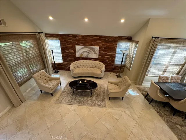 a bathroom with a double vanity sink a toilet and a mirror