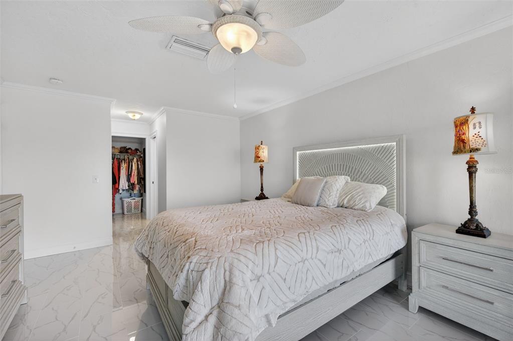 427 Boca Ciega Point Boulevard North St. Petersburg, FL 33708 - Photo 27 of 69 a bedroom with bed and window
