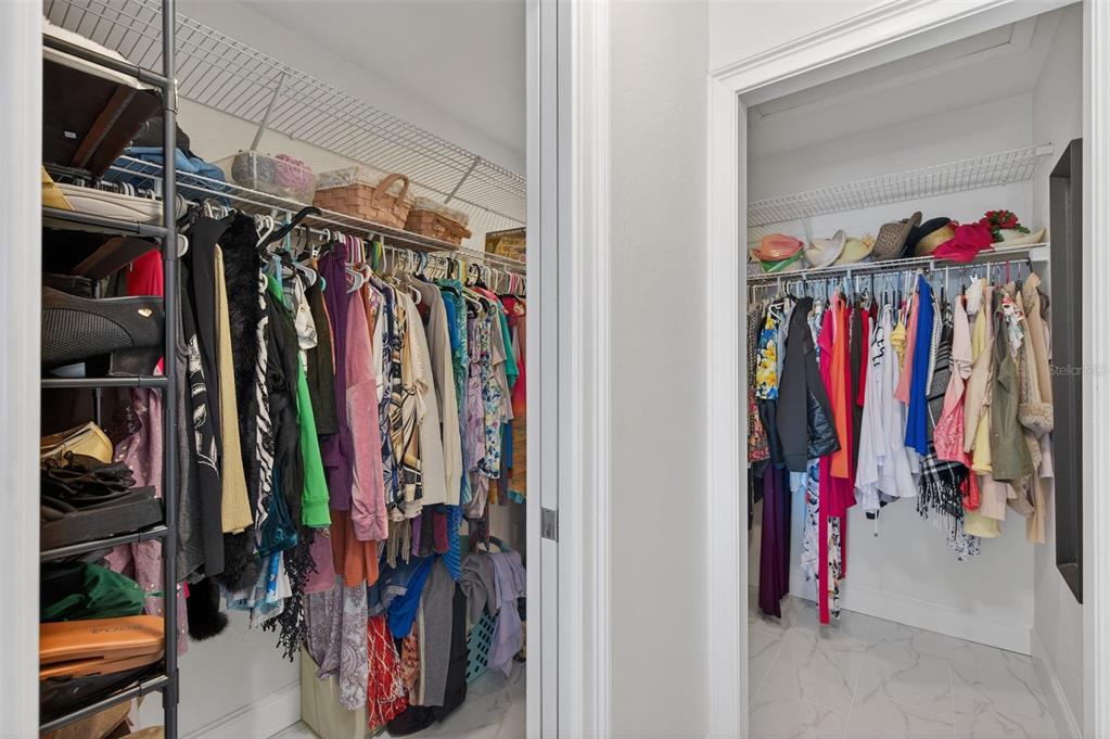 427 Boca Ciega Point Boulevard North St. Petersburg, FL 33708 - Photo 31 of 69 a view of walk in closet with clothes