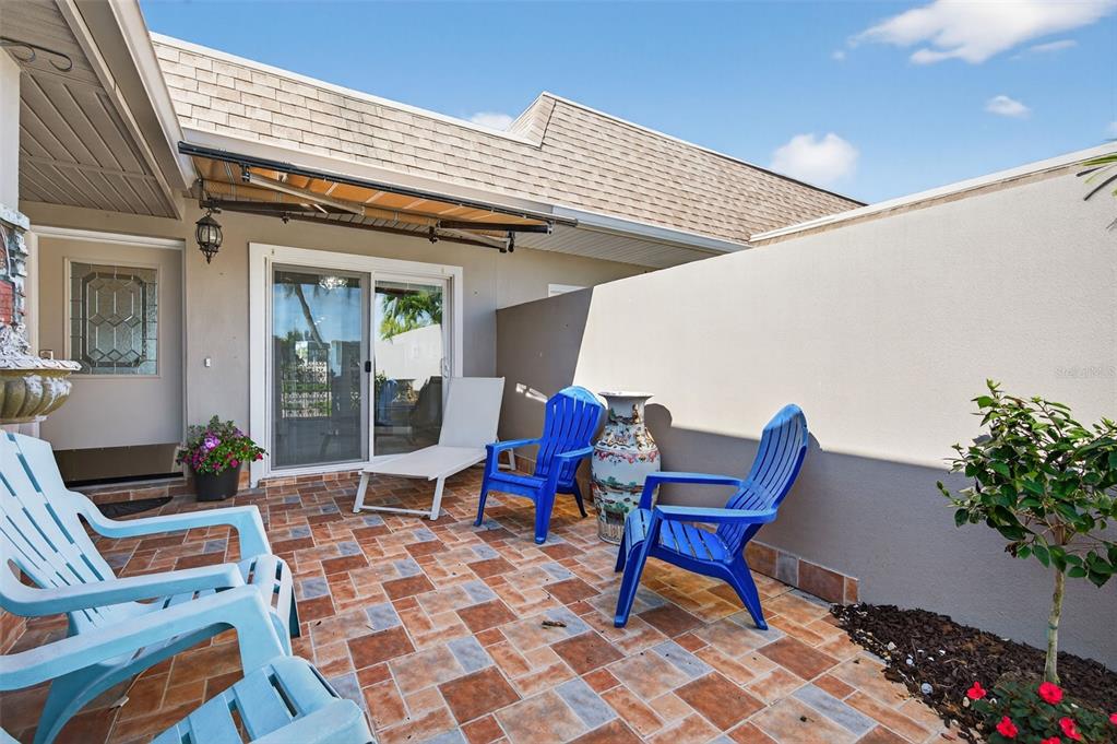 427 Boca Ciega Point Boulevard North St. Petersburg, FL 33708 - Photo 4 of 69 a building outdoor space with patio furniture