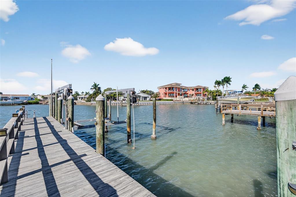 427 Boca Ciega Point Boulevard North St. Petersburg, FL 33708 - Photo 46 of 69 a view of a balcony with chairs