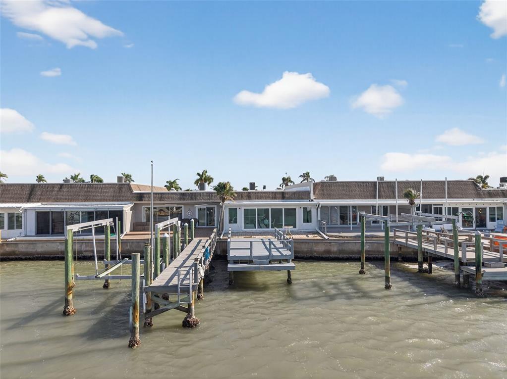427 Boca Ciega Point Boulevard North St. Petersburg, FL 33708 - Photo 48 of 69 a view of a balcony with chairs