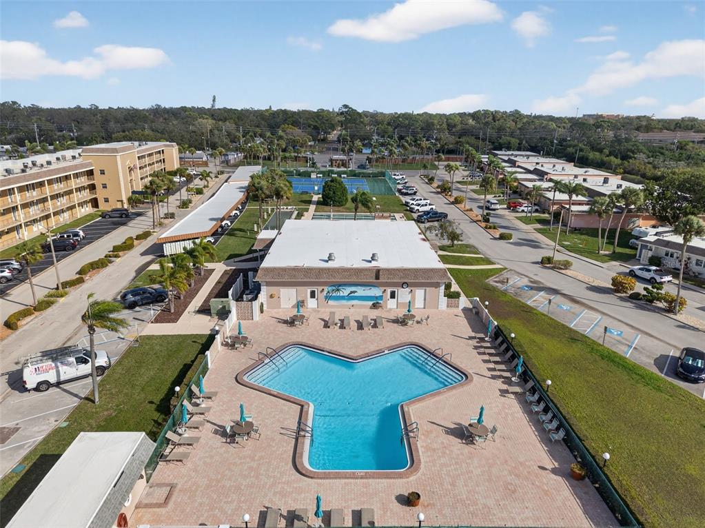 427 Boca Ciega Point Boulevard North St. Petersburg, FL 33708 - Photo 55 of 69 an aerial view of a house with a garden