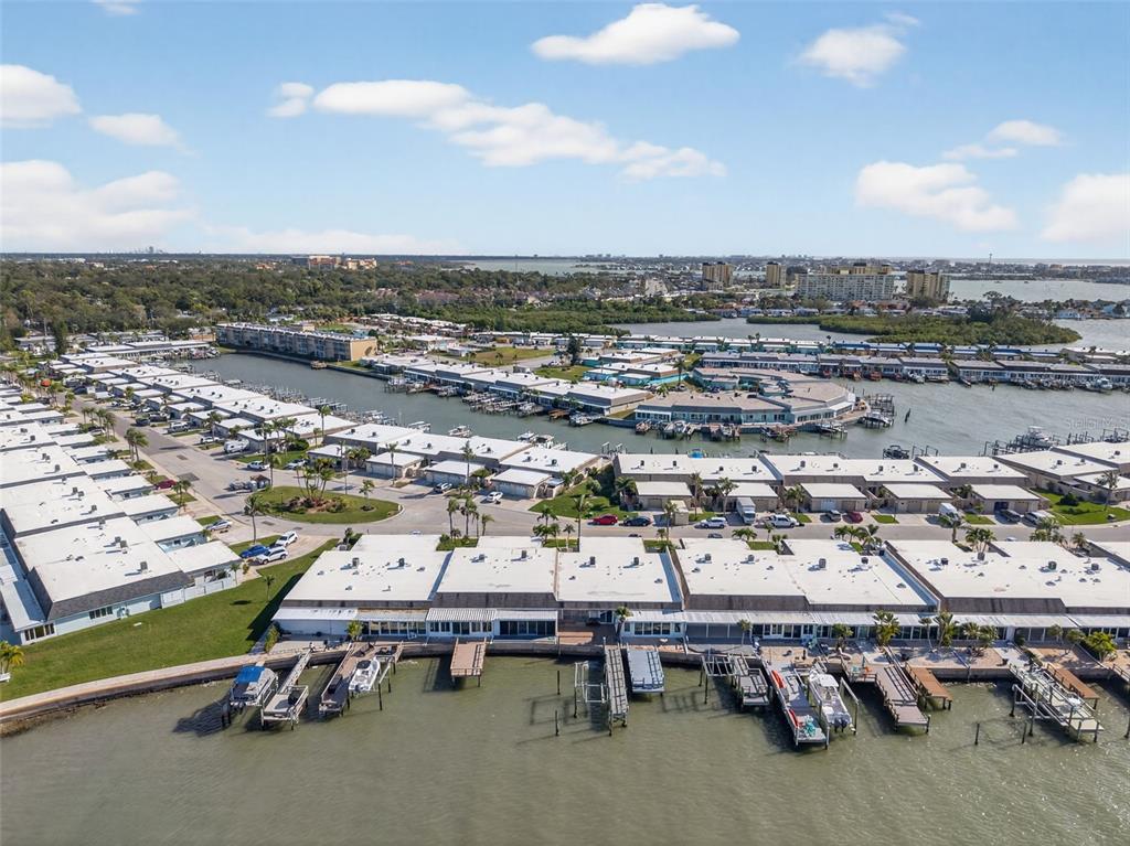 427 Boca Ciega Point Boulevard North St. Petersburg, FL 33708 - Photo 59 of 69 an aerial view of a yard with table and chairs