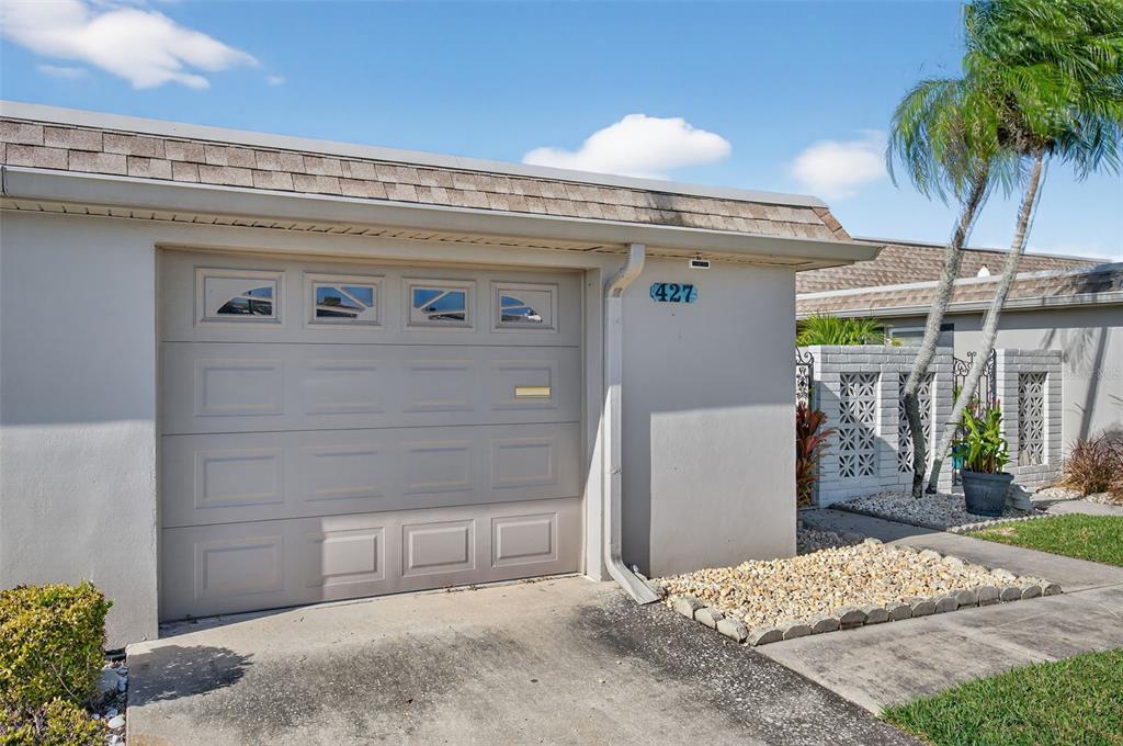 427 Boca Ciega Point Boulevard North St. Petersburg, FL 33708 - Photo 64 of 69 a front view of a house