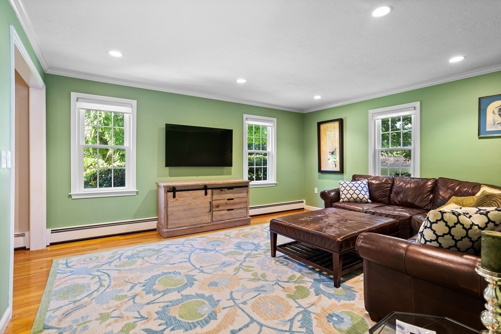 4 Fox Lane Westborough, MA 01581 - Photo 12 of 37 a bedroom with furniture and a flat screen tv