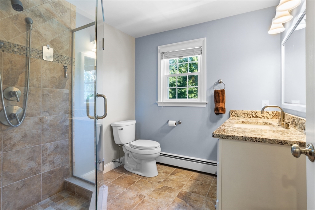 4 Fox Lane Westborough, MA 01581 - Photo 22 of 37 a bathroom with a granite countertop sink toilet and shower