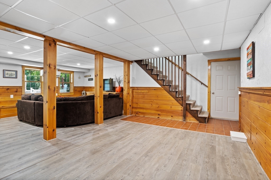 4 Fox Lane Westborough, MA 01581 - Photo 29 of 37 a view of a kitchen with furniture and wooden floor