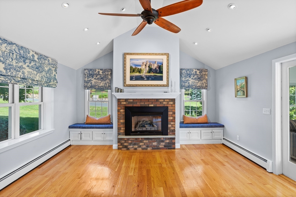 4 Fox Lane Westborough, MA 01581 - Photo 9 of 37 a living room with furniture and a fireplace