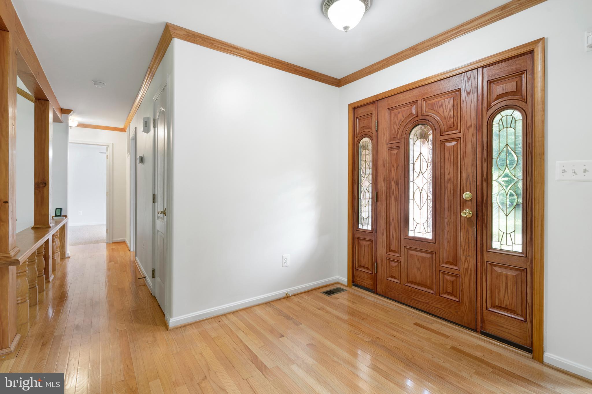 3115 Toftrees Place Brandywine, MD 20613 - Photo 32 of 60 Foyer to Hallway to Great Room and Add'l Bedrooms