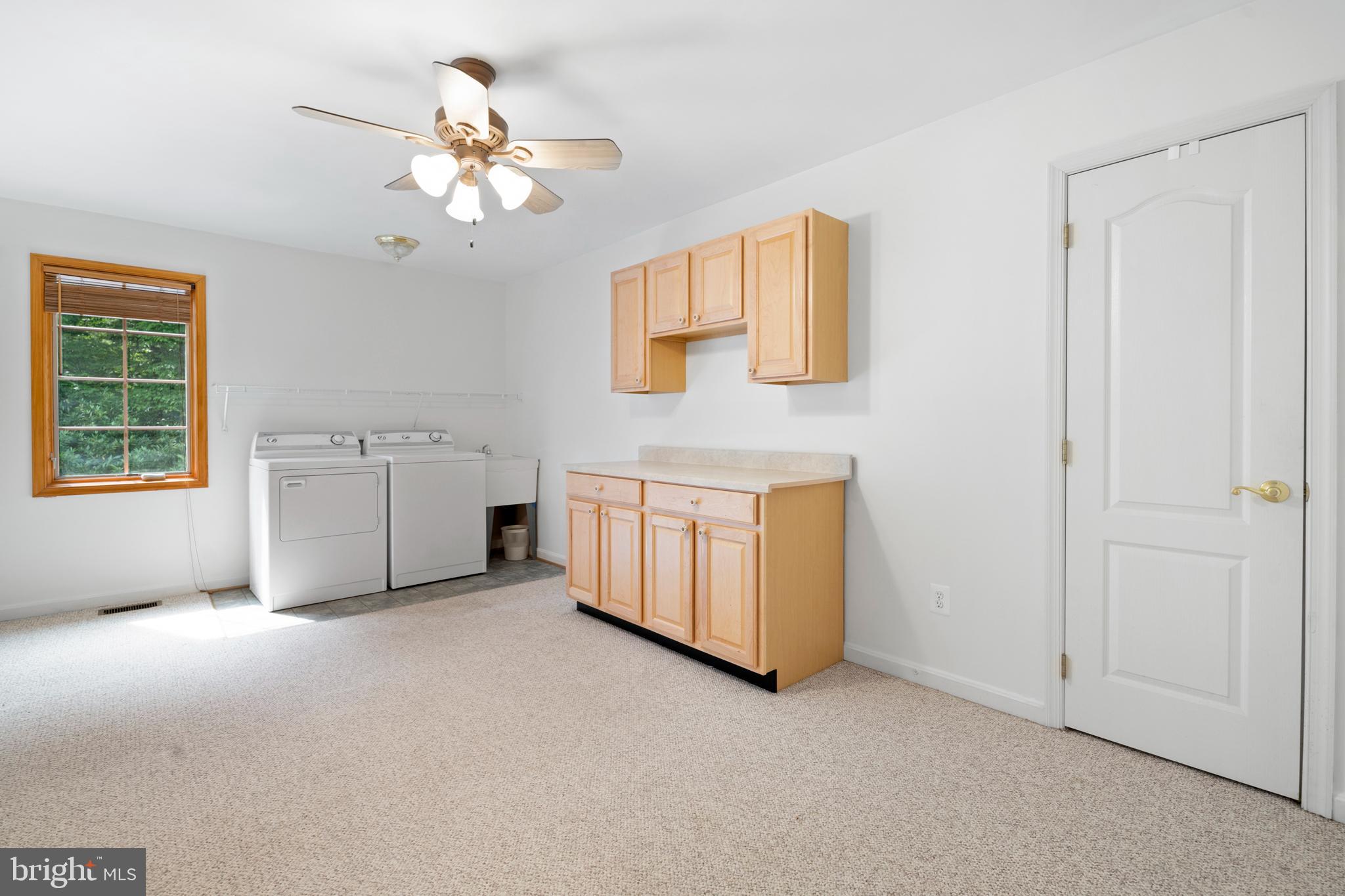 3115 Toftrees Place Brandywine, MD 20613 - Photo 40 of 60 The Ultimate Laundry Room! Make it your gym, also