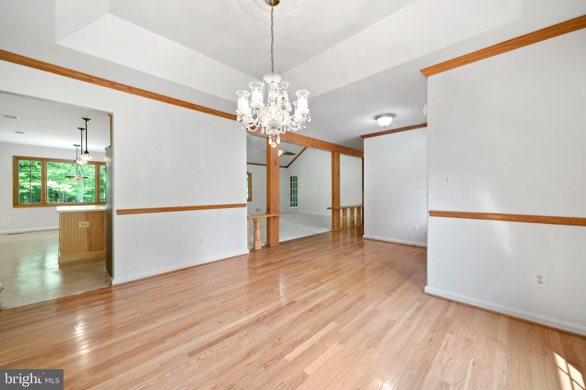 3115 Toftrees Place Brandywine, MD 20613 - Photo 8 of 60 Formal Dining Room to Kitchen and Great Room view