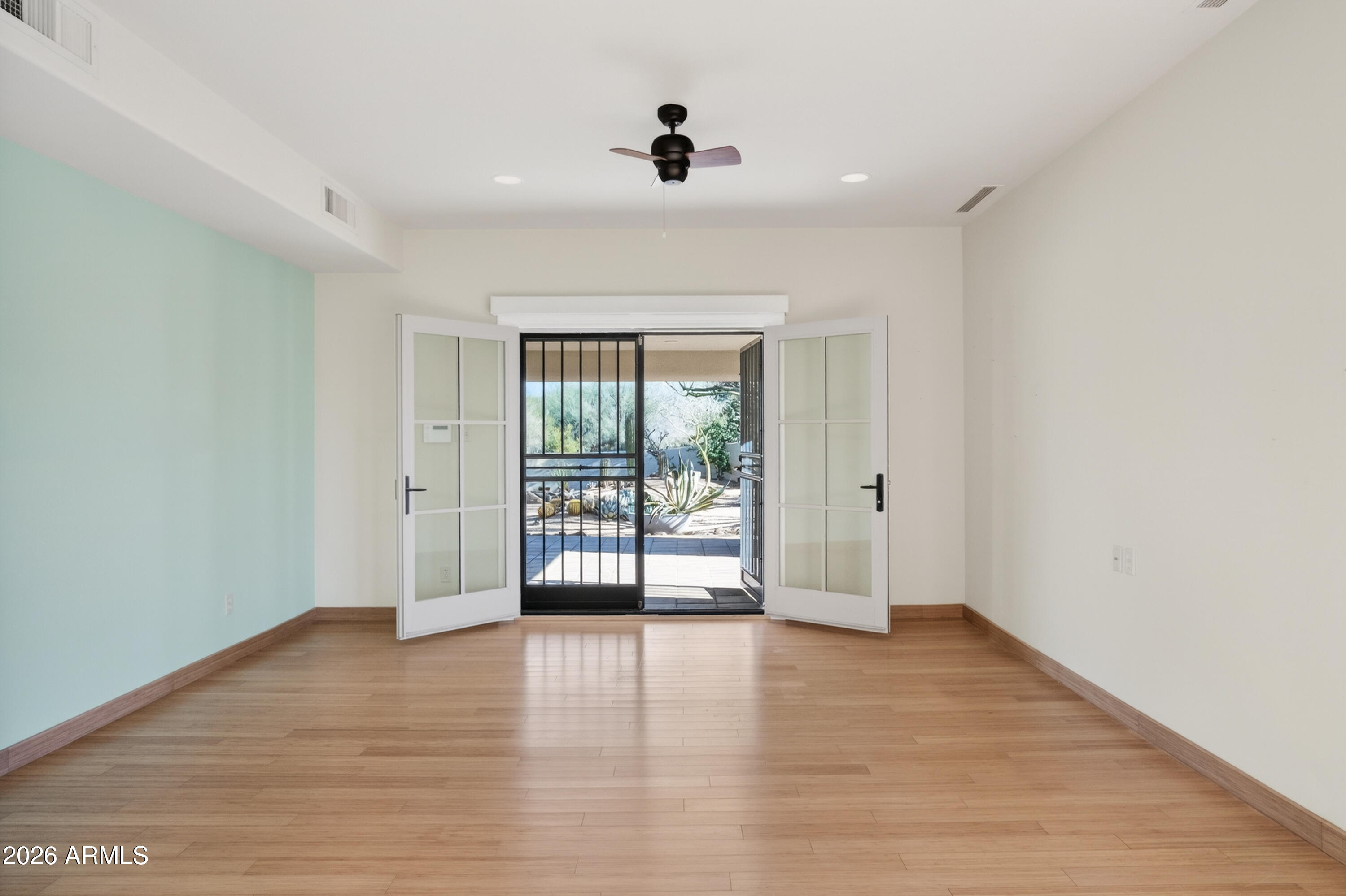 9533 East Romping Road Carefree, AZ 85377 - Photo 25 of 63 Primary w/Double Doors to Patio