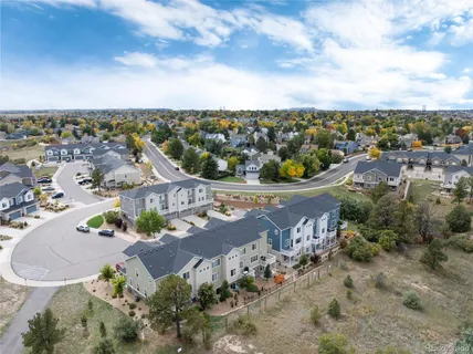 an aerial view of a house with a garden