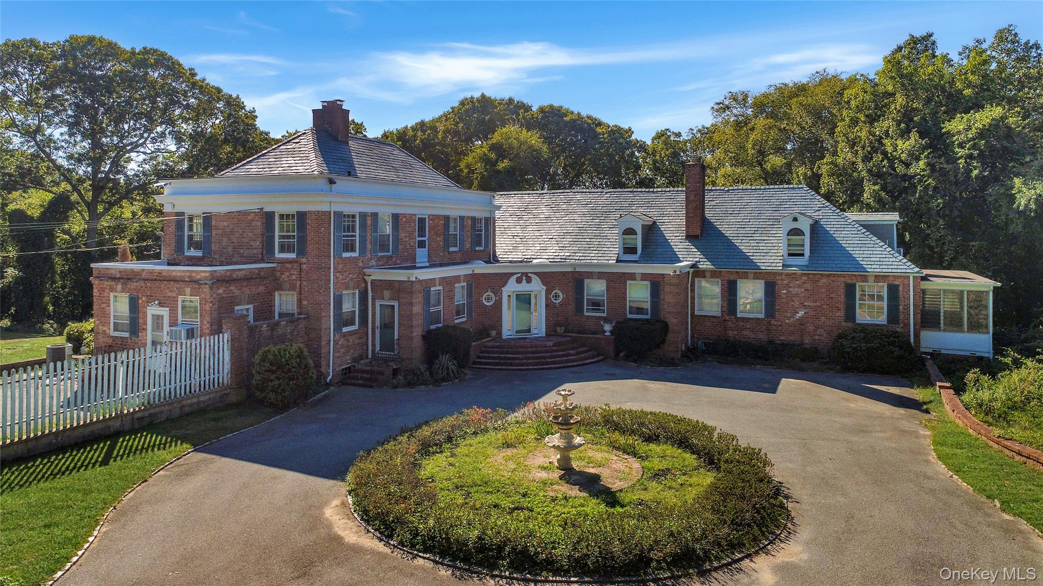 274 River Road St. James, NY 11780 - Photo 1 of 30 a front view of a house with a yard