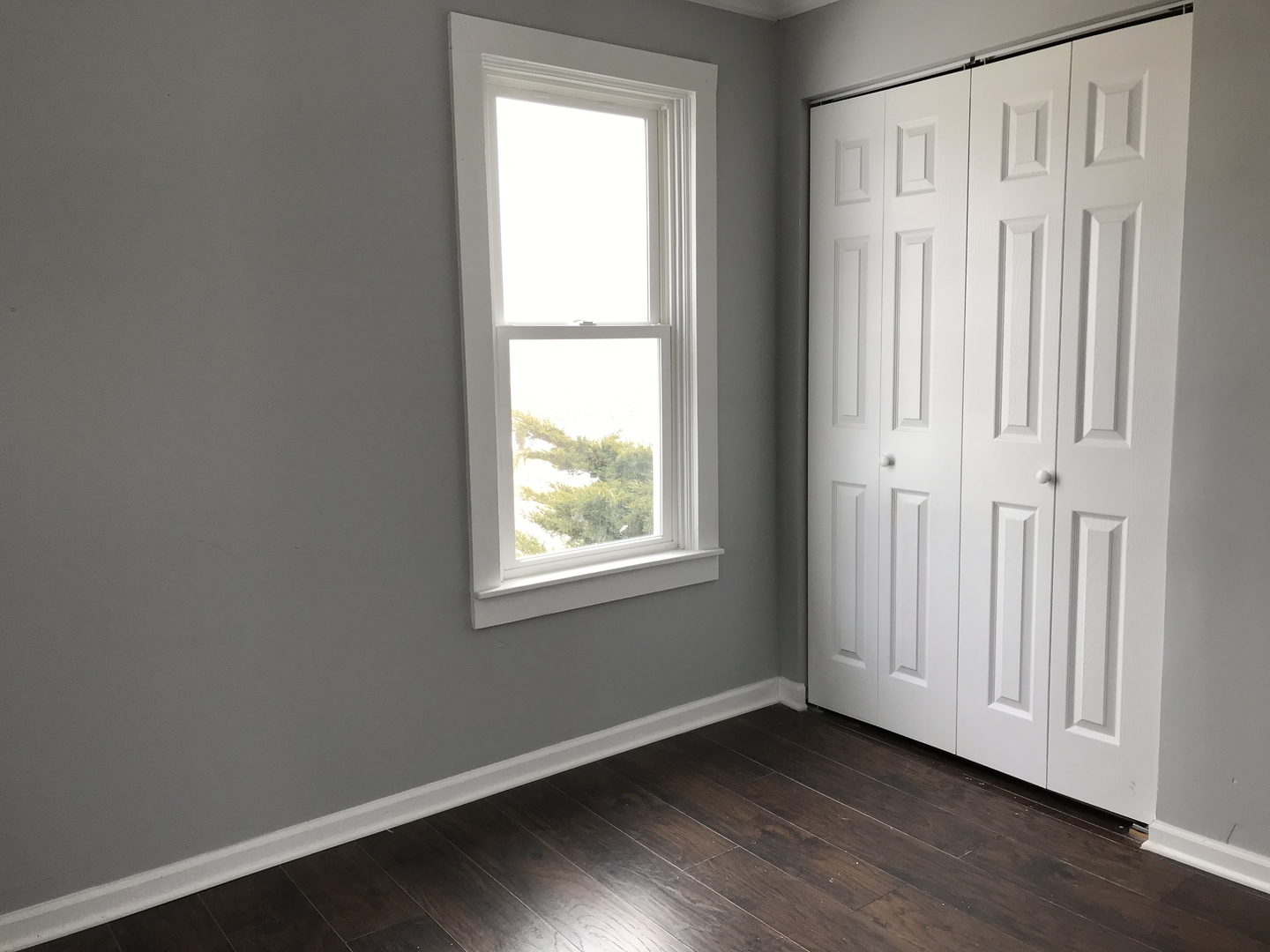 1994 Houghtby Road Shabbona, IL 60550 - Photo 15 of 45 an empty room with wooden floor and windows