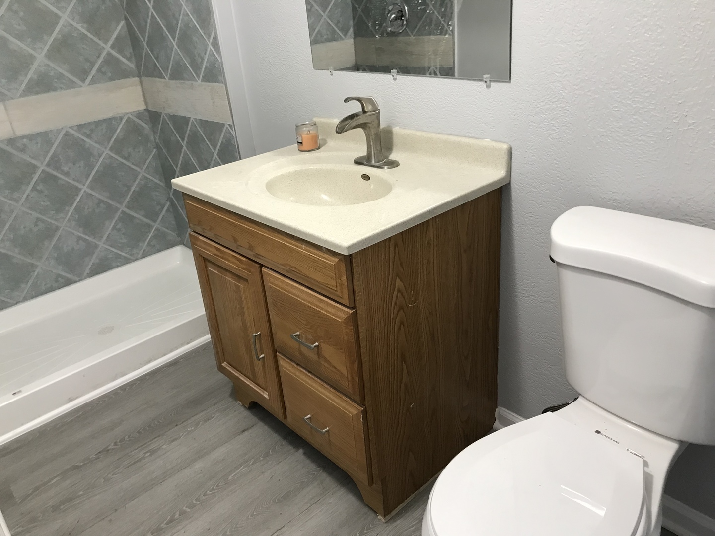 1994 Houghtby Road Shabbona, IL 60550 - Photo 19 of 45 a bathroom with a sink toilet and mirror