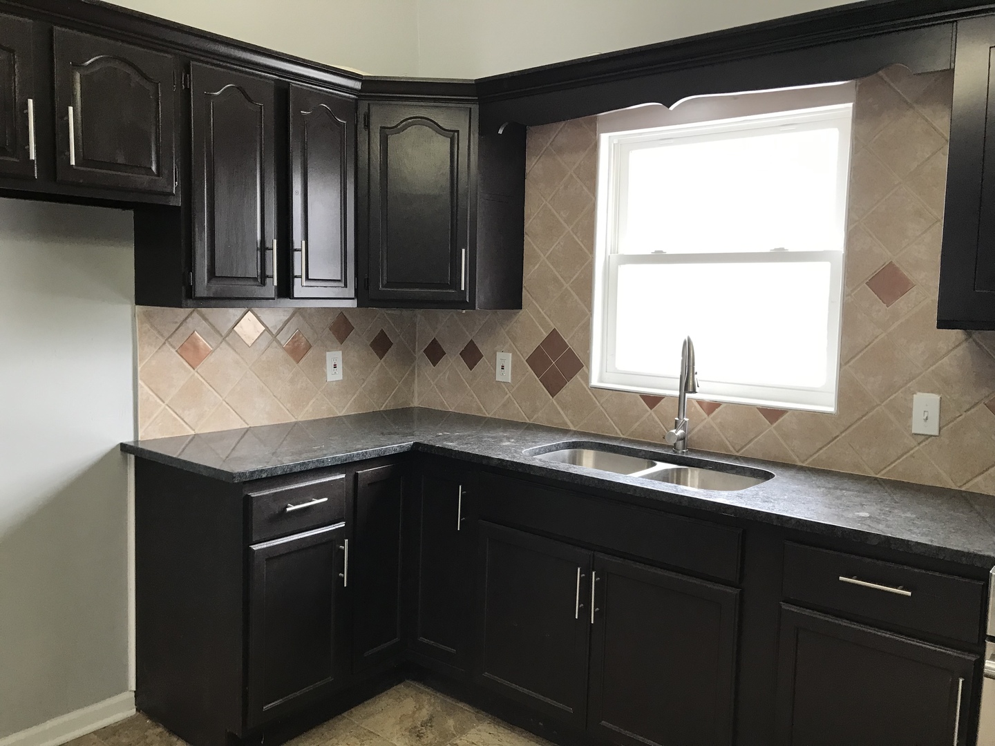 1994 Houghtby Road Shabbona, IL 60550 - Photo 3 of 45 a kitchen with granite countertop cabinets sink and window