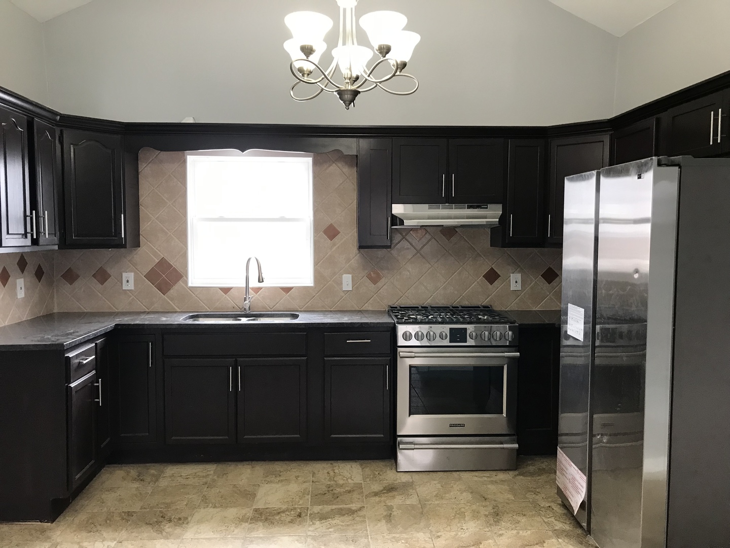 1994 Houghtby Road Shabbona, IL 60550 - Photo 4 of 45 a kitchen with a stove and a refrigerator