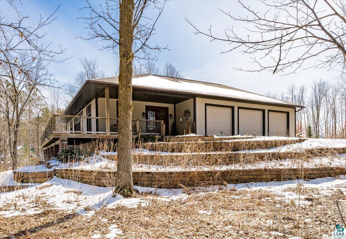 92598 Spells Road Sturgeon Lake, MN 55783 - Photo 1 of 60 View of front of house featuring a garage