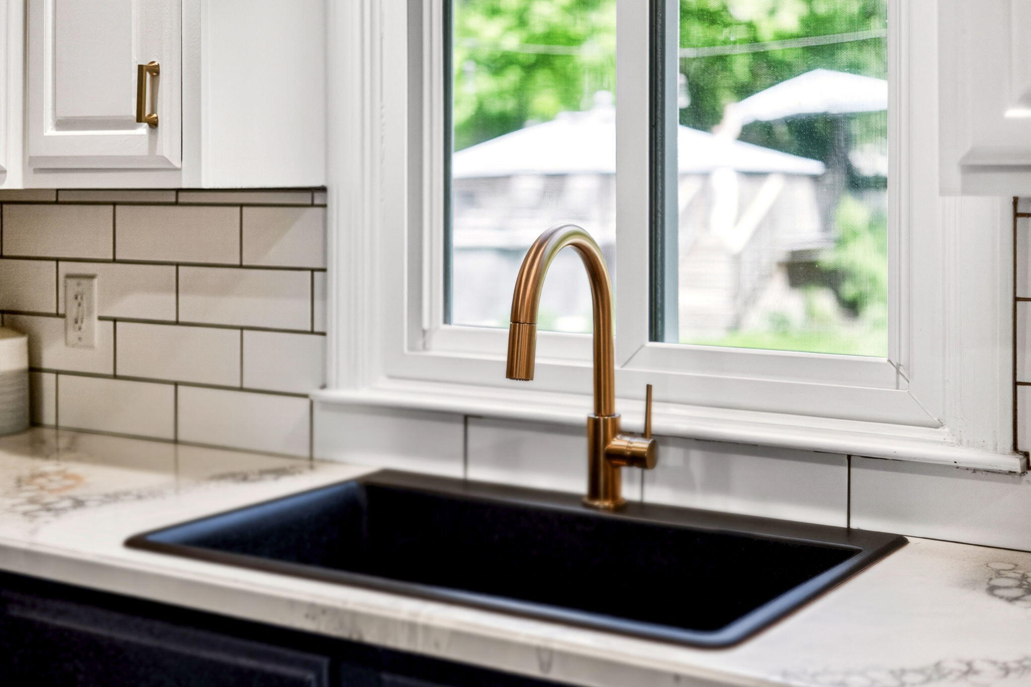 12 Sarah Lawrence Road Sandwich, MA 02563 - Photo 4 of 54 a view of a sink a counter space and a window