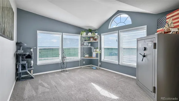 a view of livingroom with furniture and windows