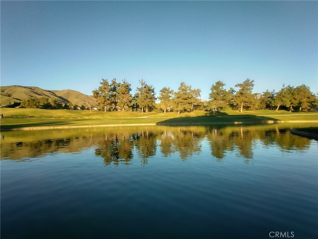 11811 Cramer Road Yucaipa, CA 92399 - Photo 56 of 56 a view of a lake with houses in the back